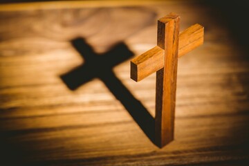 Close-up of wooden cross on floor