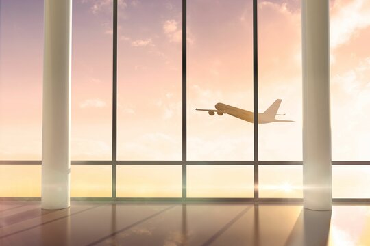Fototapeta Airplane flying past window at sunrise