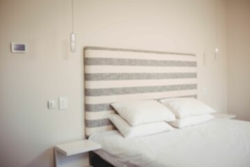 Clean bed in bedroom at home