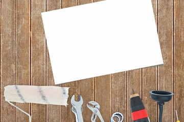 Equipments with paper on wooden flooring