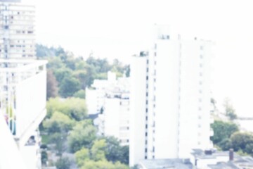 Blurry view of cityscape during summer