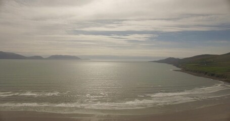 Seascape against cloudy sky