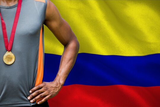 Naklejki Midsection of medalist against Columbian Flag