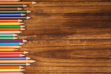 Color pencils on wooden tabl