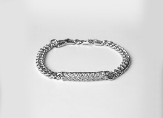 Silver bracelet with thick chain isolated on white background