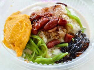Delicious Durian Flavored Red Bean Cendol Ice Dessert in Clear Glass Bowl