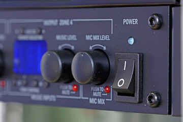 Front control panel of the audio amplifier with level controls and display. 