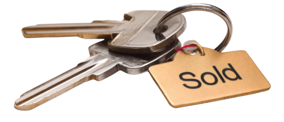 Keys representing property sale with a "Sold" tag. The keys represent a closed deal, a new beginning, and the realization of property ownership.
