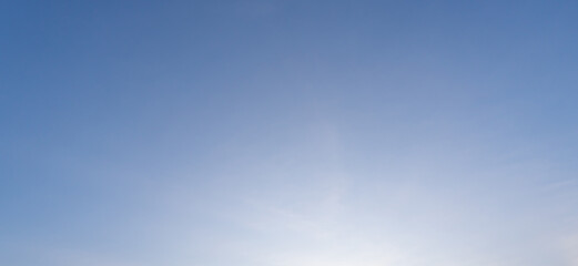 Low angle view and full frame of beautiful light blue sky without clouds in the morning or...