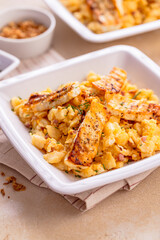 German egg dumplings with bacon, fried onions and grilled Halloumi cheese
