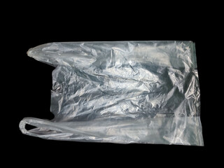 A transparent plastic bag on black isolated background