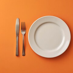 empty plate with fork knife and spoon