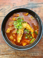 Tom Yum Soup close up background. Stock photo.