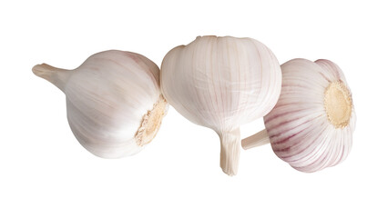 White garlic bulbs in stack are isolated with clipping path in png file format.