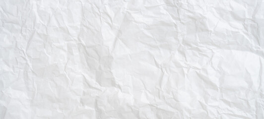 Fototapeta premium Top view and full frame of wrinkled or crumpled white paper texture used as crumpled white paper background texture in decorative art work