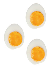 Top view set of unpeeled cooked or boiled chicken eggs in three halves with egg yolks isolated with clipping path in png file format