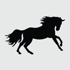 silhouette image of a black horse pose