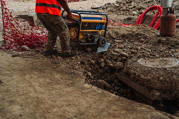City infrastructure repair scene with open roads, red polypropylene pipes, construction workers,...