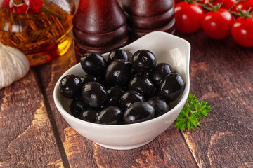 Mediterranean marinated Black olives in the bowl