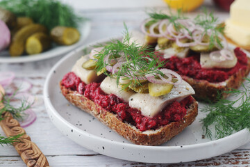 Scandinavian sandwiches with herring and beetroot