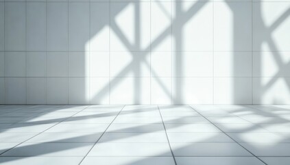 Empty, sunlit room with white tile