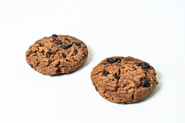 Close up view of two chocolate chip cookies isolated on white background. Close up. clipping path.