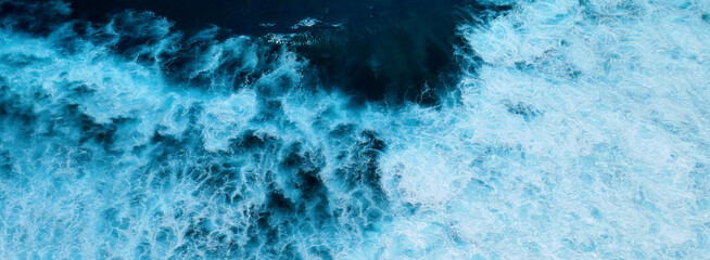 Banner Turquoise ocean sea water white wave pattern splashing deep blue sea. Banner Tropical sea...