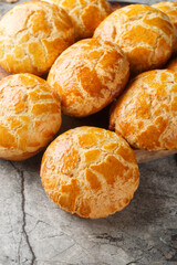 Pineapple buns Bo Lo Bao is a kind of sweet bun from Hong Kong the name refers to the look of the characteristic topping closeup on the table. Vertical