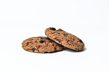 Side view of two chocolate chip cookies isolated on white background. Close up. clipping path. pile, stack.