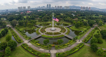 Naklejka premium Aerial View of Merdeka Square in Kuala Lumpur, Malaysia: A Stunning Panorama of Lush Greenery and City Skyline