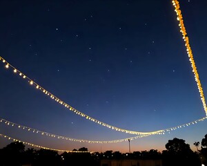Fototapeta premium Night Sky Illuminated Twinkling Lights Against the Starry Dusk