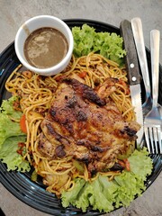 A plate of chicken grill with spagetti © OKK