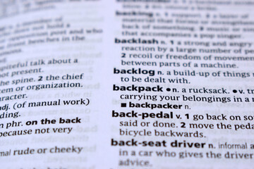 Close Up Of English Dictionary Page With Definition Word -Backpack