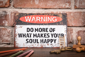Vintage Inspirational Sign Saying Do More of What Makes Your Soul Happy on Rustic Background