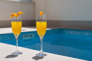 Two Mimosas by the Poolside