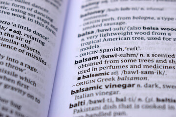 Close Up Of English Dictionary Page With Definition Word -Balsam