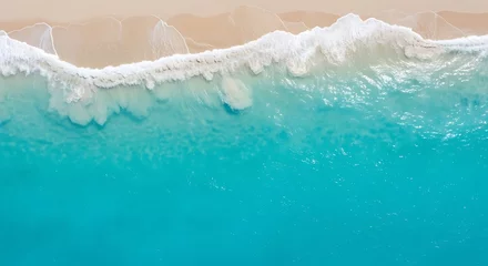 Selbstklebende Fototapeten Aerial view of ocean waves washing onto sandy beach © Citra