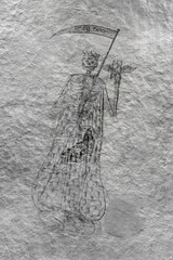 Crypt of the Holy Sepulchre church in Cagliari (Sardinia, Italy): fresco depicting Death with Latin words Nemini parco (I spare no one) in the