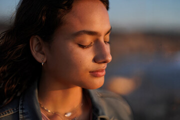 Portrait of Serene Woman with Eyes Closed