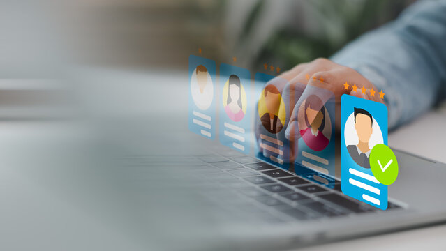 HR managers select candidate profiles with rating stars on a digital interface, an online HR recruitment system, talent selection, employee evaluation, and a smart hiring process. - Powered by Adobe