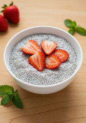 Chia seed pudding with strawberries and mint