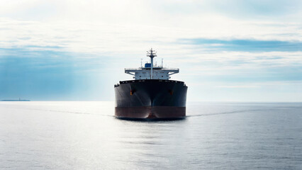 Oil trade international. Large cargo ship oil tanker ocean maritime transportation shipping blue sky water international trade calm ,global shipping, energy, crude oil market, energy economy