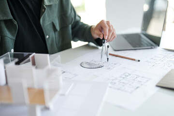 Architecture Man drawing on architectural Creative project business architecture building...