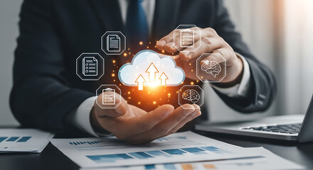 Businessman holding a cloud computing illustration representing data storage and technology.
