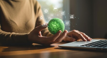 Glowing green orb in hands, icons floating above laptop on wooden desk.