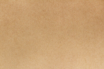 Cardboard sheet texture background, pattern of brown kraft paper with vintage style.