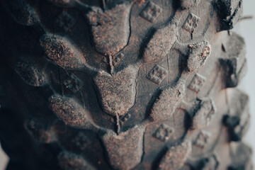 black and gray bicycle tire texture with macro lens