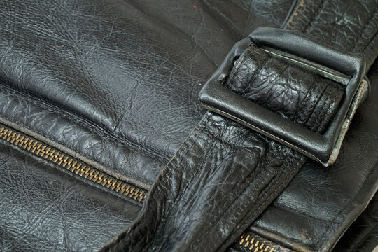 Old and aged black leather perfectoin