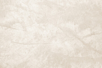 Old concrete wall texture background. Close up retro plain cream color cement wall background texture. Design paper vintage parchment element.
