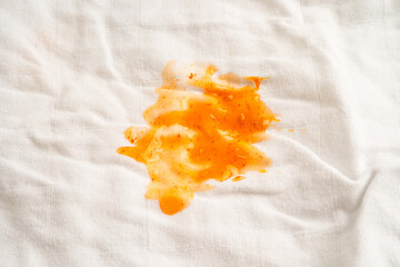 Dirty tomato sauce stain or ketchup on cloth to wash with washing powder, cleaning housework.